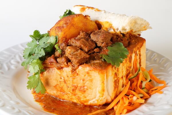 Typical South African food: bunny chow - curry in a holed-out bread