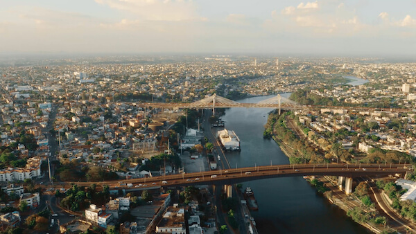 Santo Domingo is the Dominican Republic's capital city. The Ozama River runs through the city.